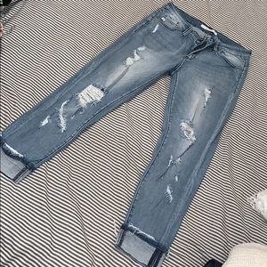 Destroyed cuff denim